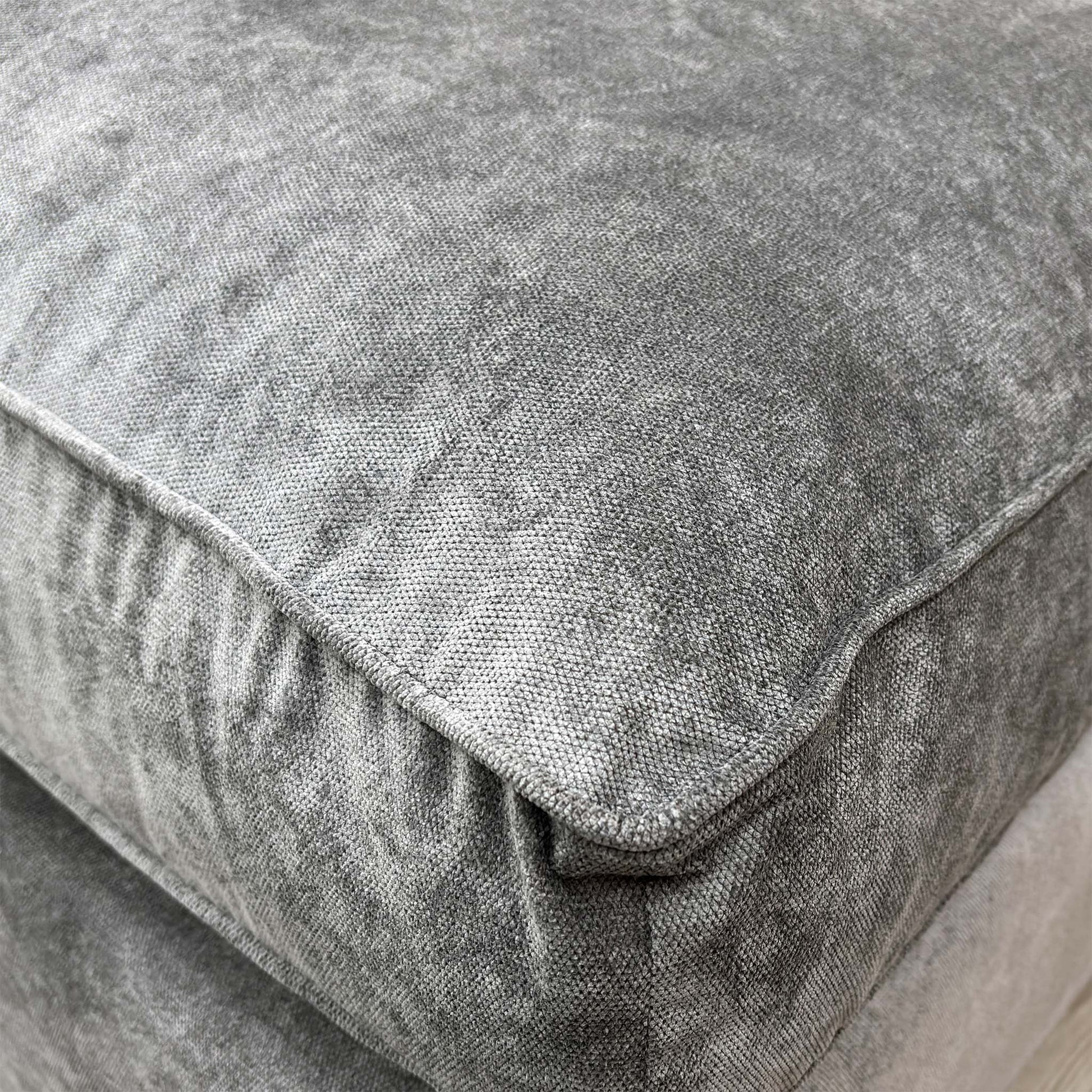 Close-up detail of the premium Kingston grey fabric weave, emphasizing the durable and soft-touch textile finish.