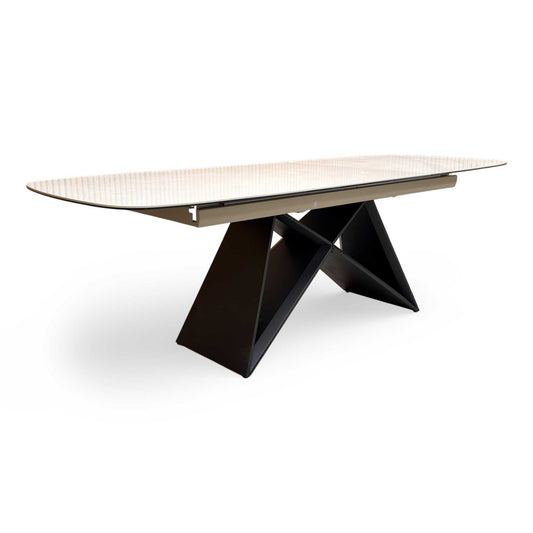 Full view of the ‘Oasis’ 180cm Extending Dining Table featuring a sleek white ceramic top and a modern black metal pedestal base.