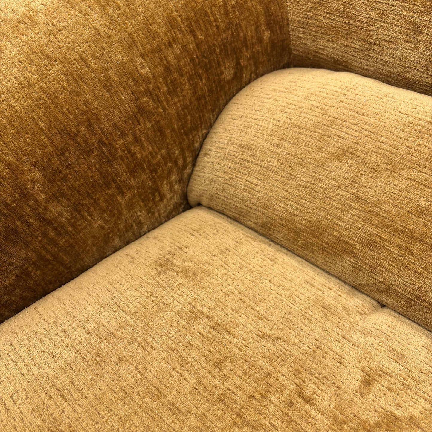 Close-up detail of the premium mustard chenille upholstery, showcasing the soft, durable fabric texture.