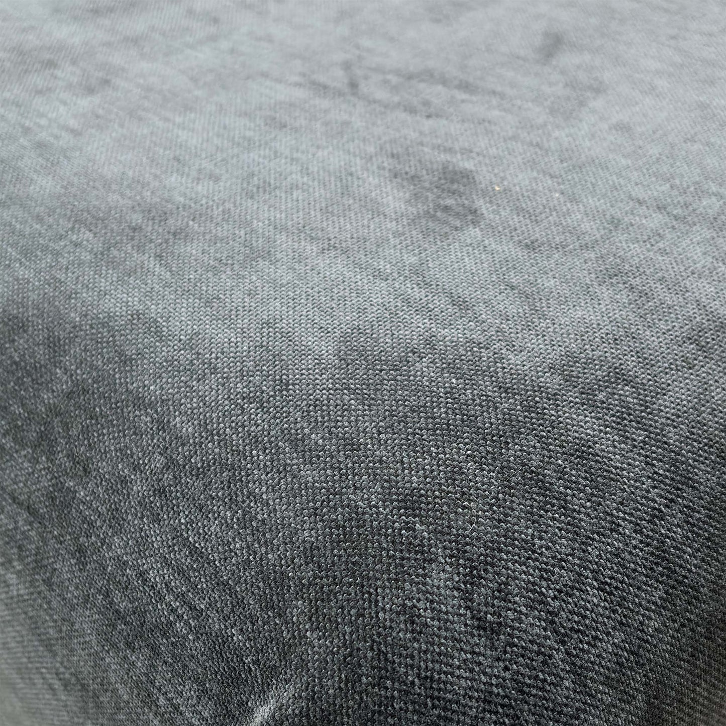 Close-up detail of the Carbon grey upholstery fabric, showcasing the durable weave and textured finish.
