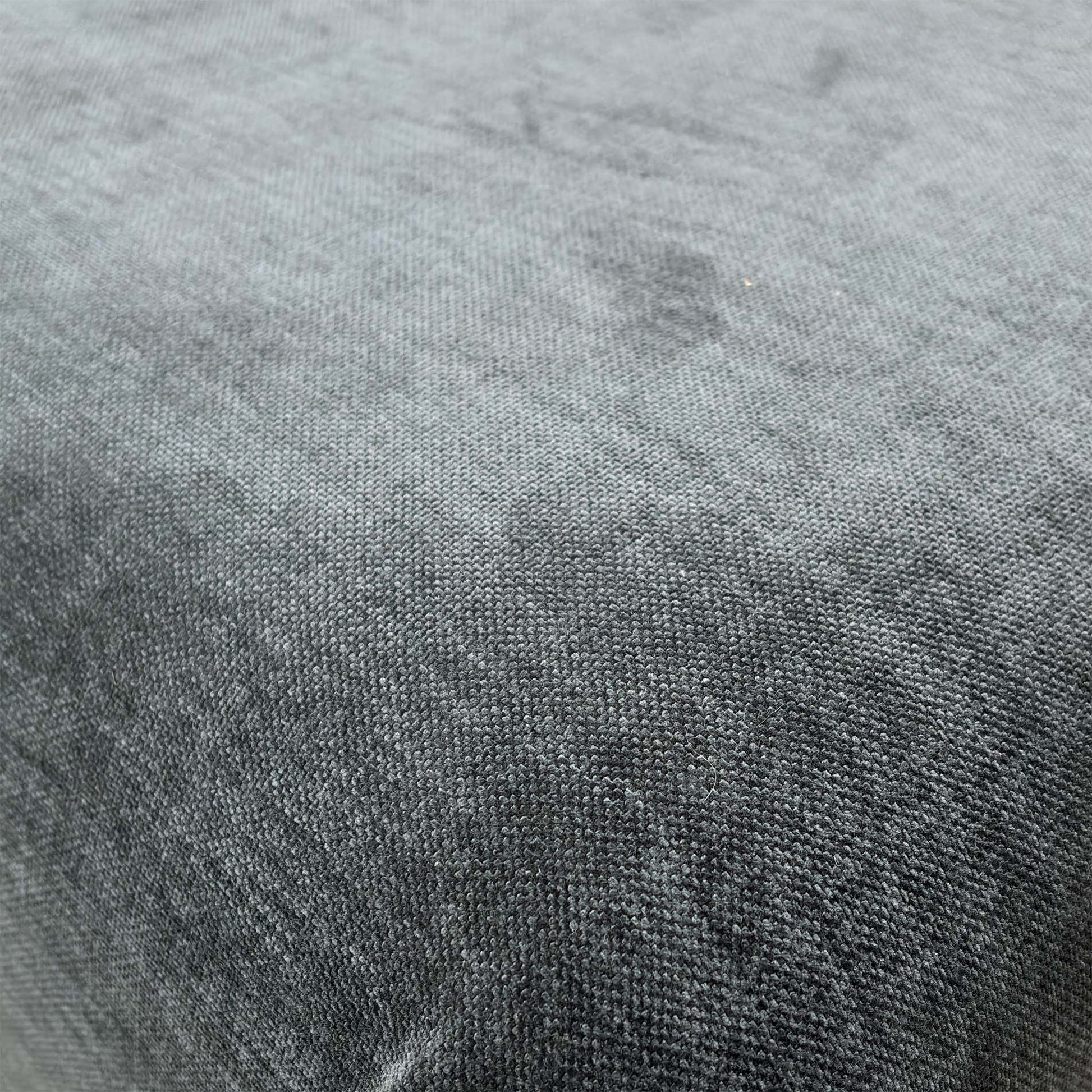 Close-up detail of the Carbon grey upholstery fabric, showcasing the durable weave and textured finish.