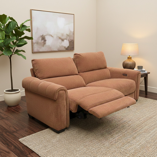Living Room view of the Nixon caramel fabric sofa highlighting the contemporary design and padded armrests.