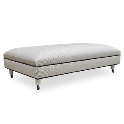 Front angle view of the Furniture Village ‘Ambassador’ Allure Noir Eby Ft fabric footstool in a deep charcoal finish.