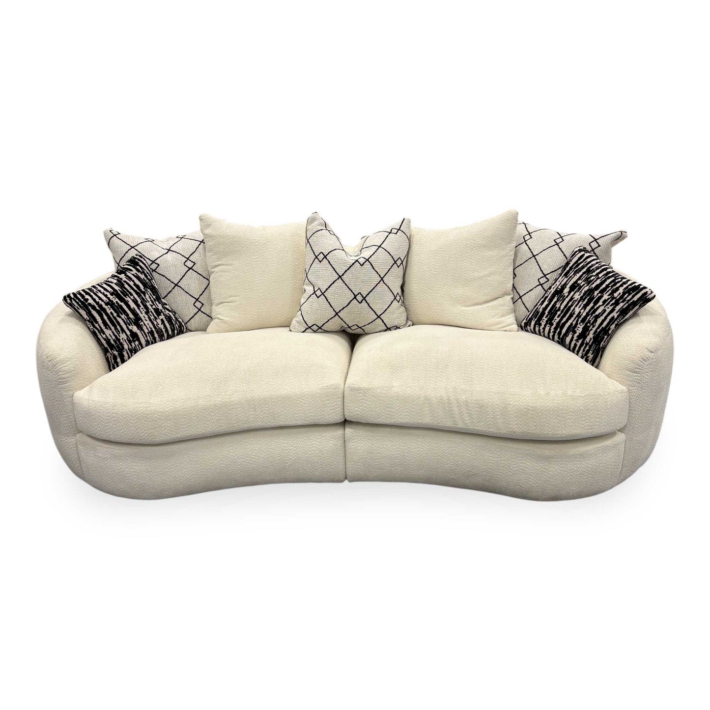 Elevated front angle of the ‘Bow’ 4-seater sofa highlighting the plush, uniform cushioning.