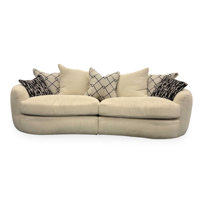 Front view of the Fabb ‘Bow’ 4-seater sofa in Ecru Ivory Boucle fabric featuring a curved backrest.