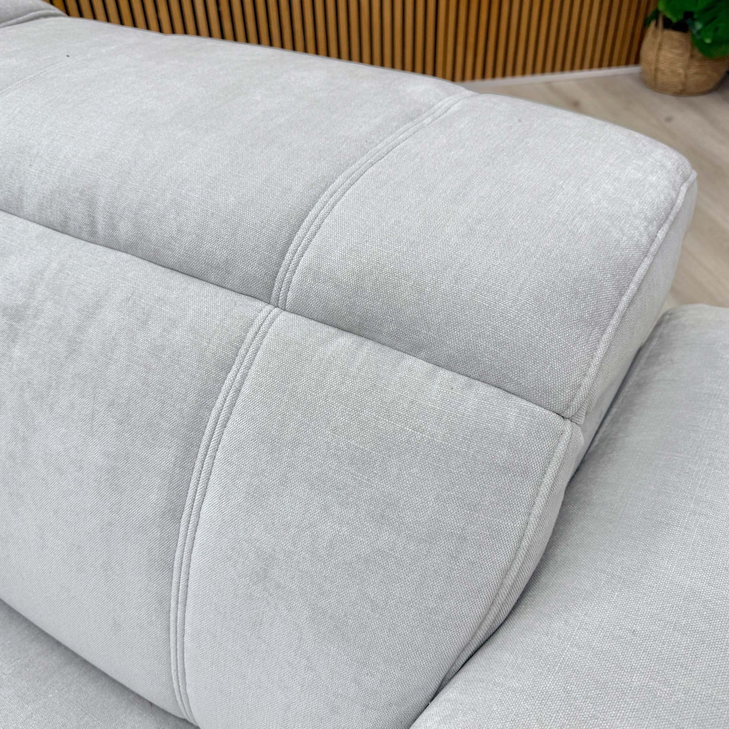 Detailed shot of the durable 58004 Manhattan Stone linen fabric and textured weave finish.