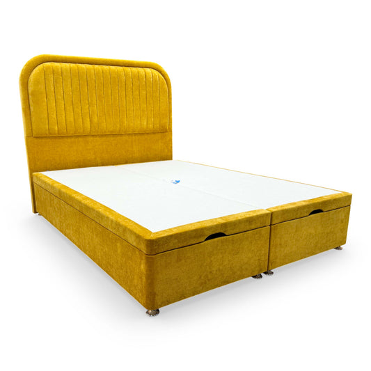 Full view of the Highgrove ‘Portland’ King Bed featuring a tall, floor-standing Aston Saffron yellow fabric headboard and a matching ottoman divan base.