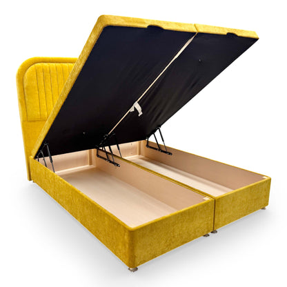 Image of the double end-lift ottoman base in the open position, demonstrating the vast hidden storage space beneath the mattress.