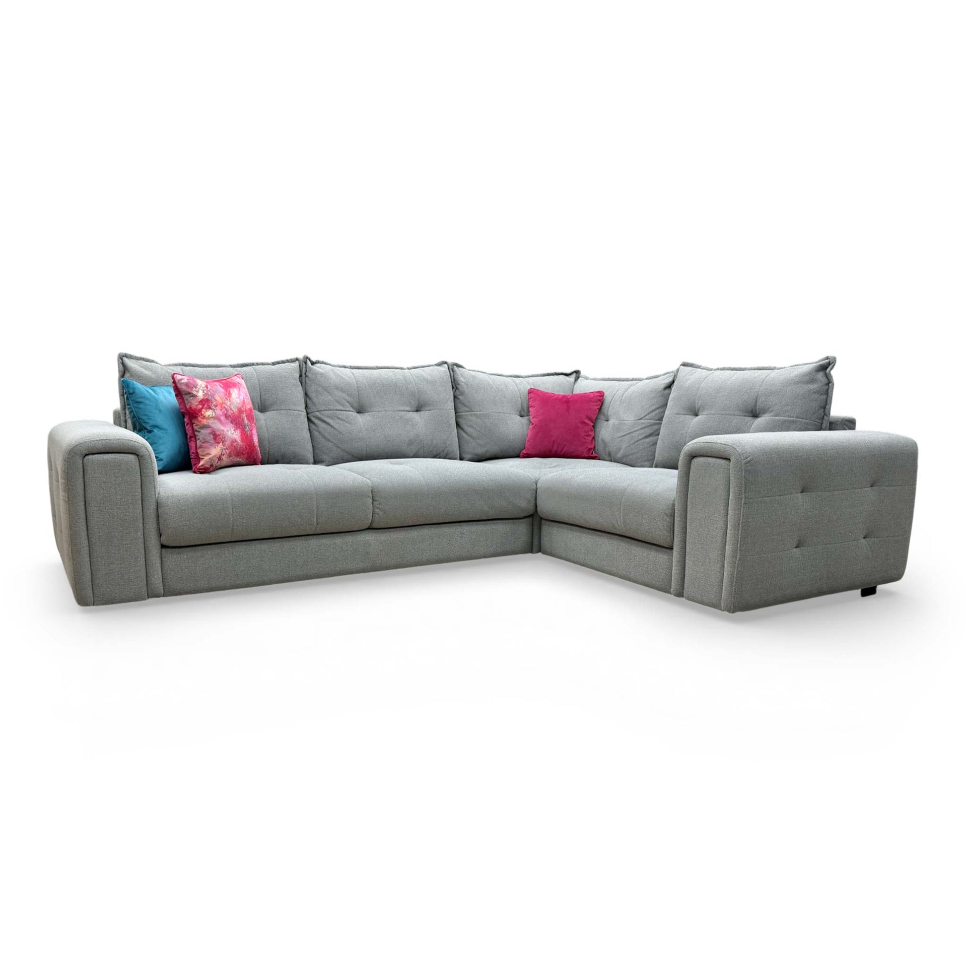 Front-facing view of the ‘Goliath’ Oxford Grey right-hand facing corner sofa featuring plush pillow-back cushions.
