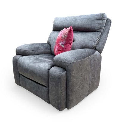Side profile of the ‘Cinemax’ armchair showing its ergonomic shape and sleek velvet finish.