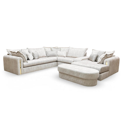 Full view of the Savoy 3 corner 3 chaise sofa in dapple cream velvet with marble pattern and gold trim.