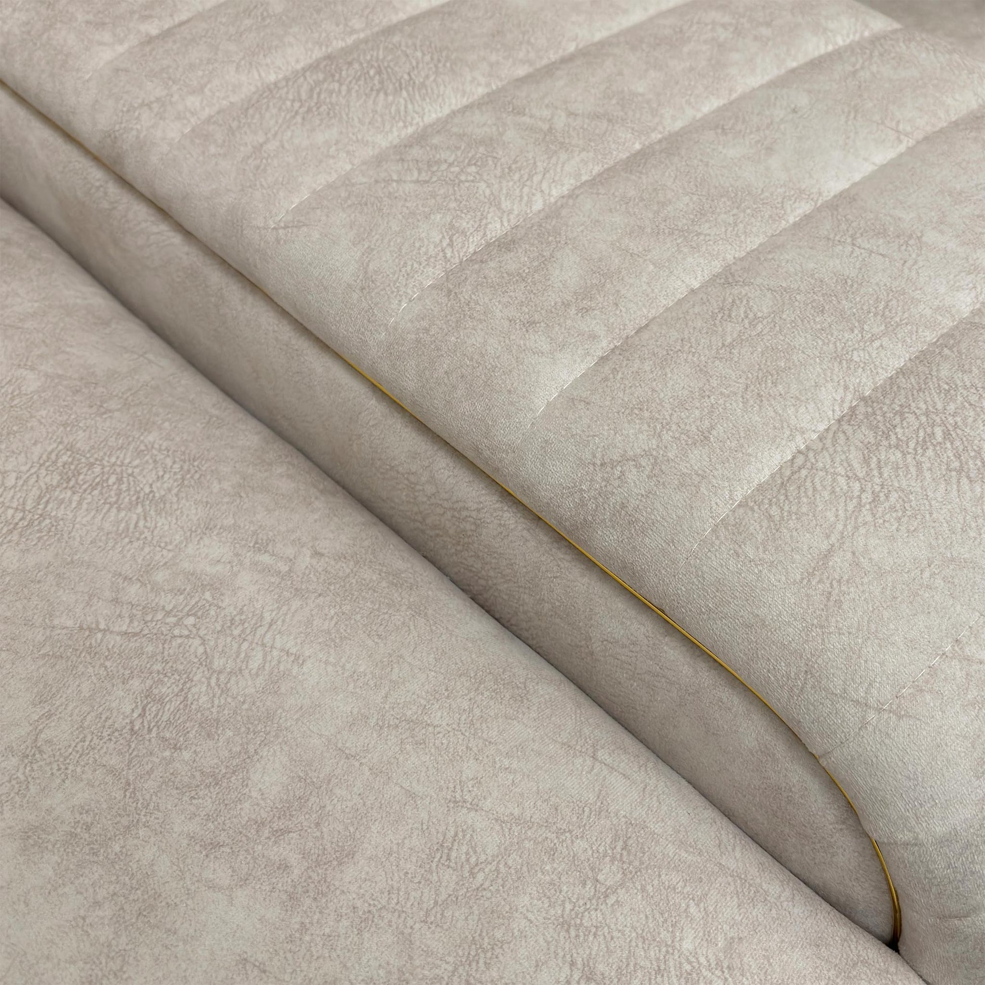 Close-up of the integrated wooden console and gold trim accents, emphasizing the high-end finish and functionality.