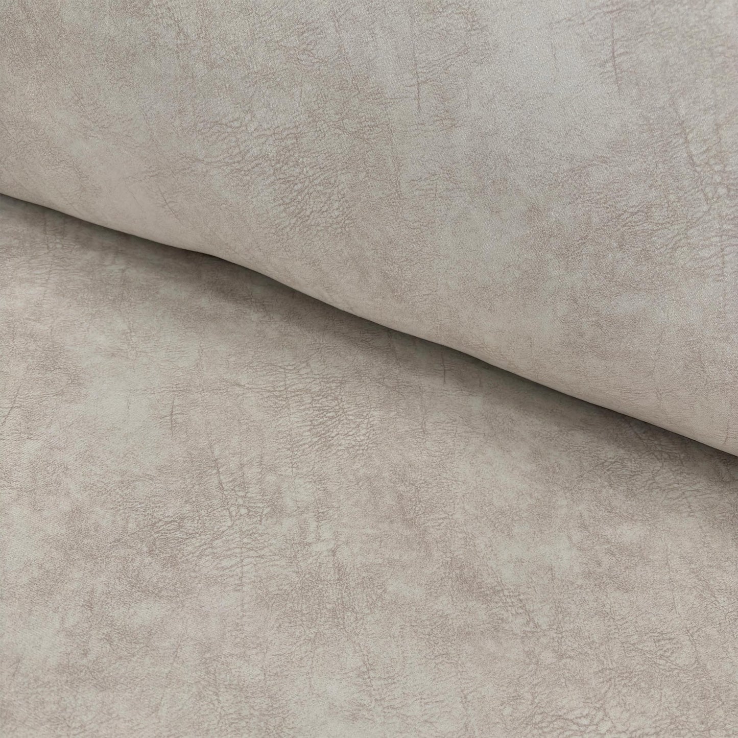 Detailed shot of the luxurious dapple cream velvet fabric with its unique marble-patterned texture.