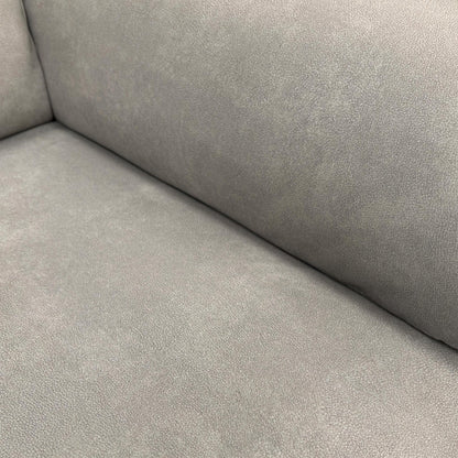 Detailed shot of the high-quality Dexter Stone 43502 velvet upholstery and textured fabric finish.