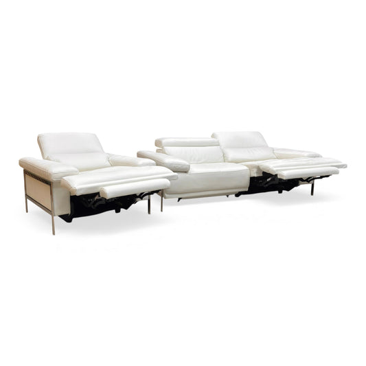 Full view of the Nicoletti Theron 3-seater power sofa and matching chair in Torello Bianco Puro white Italian leather, showcasing a sleek modern design.