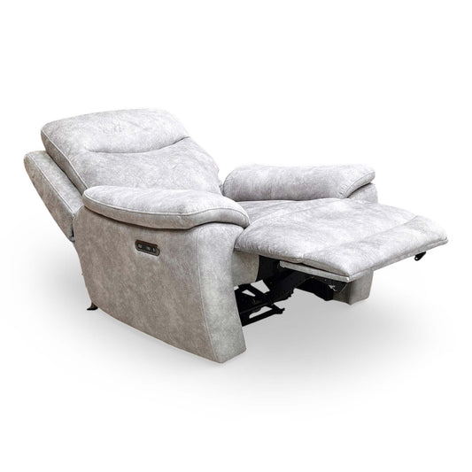 Full view of the Furniture Village ‘Sloane’ Power Recliner Chair in Marble Stone Grey Velvet, featuring a modern design and plush cushioning.