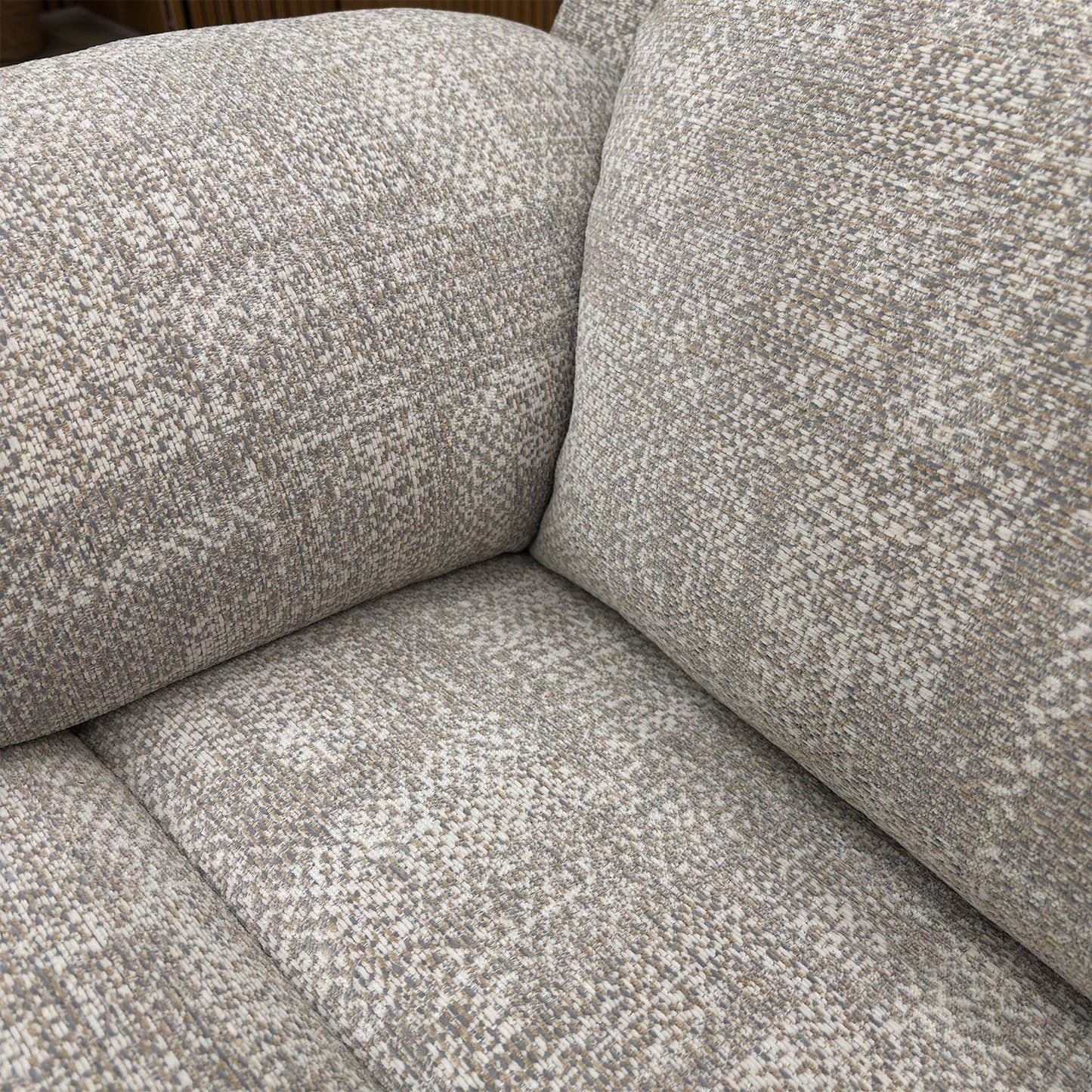 Close-up of the Aerial Horizon upholstery, emphasizing the durable woven texture and subtle grey tones.