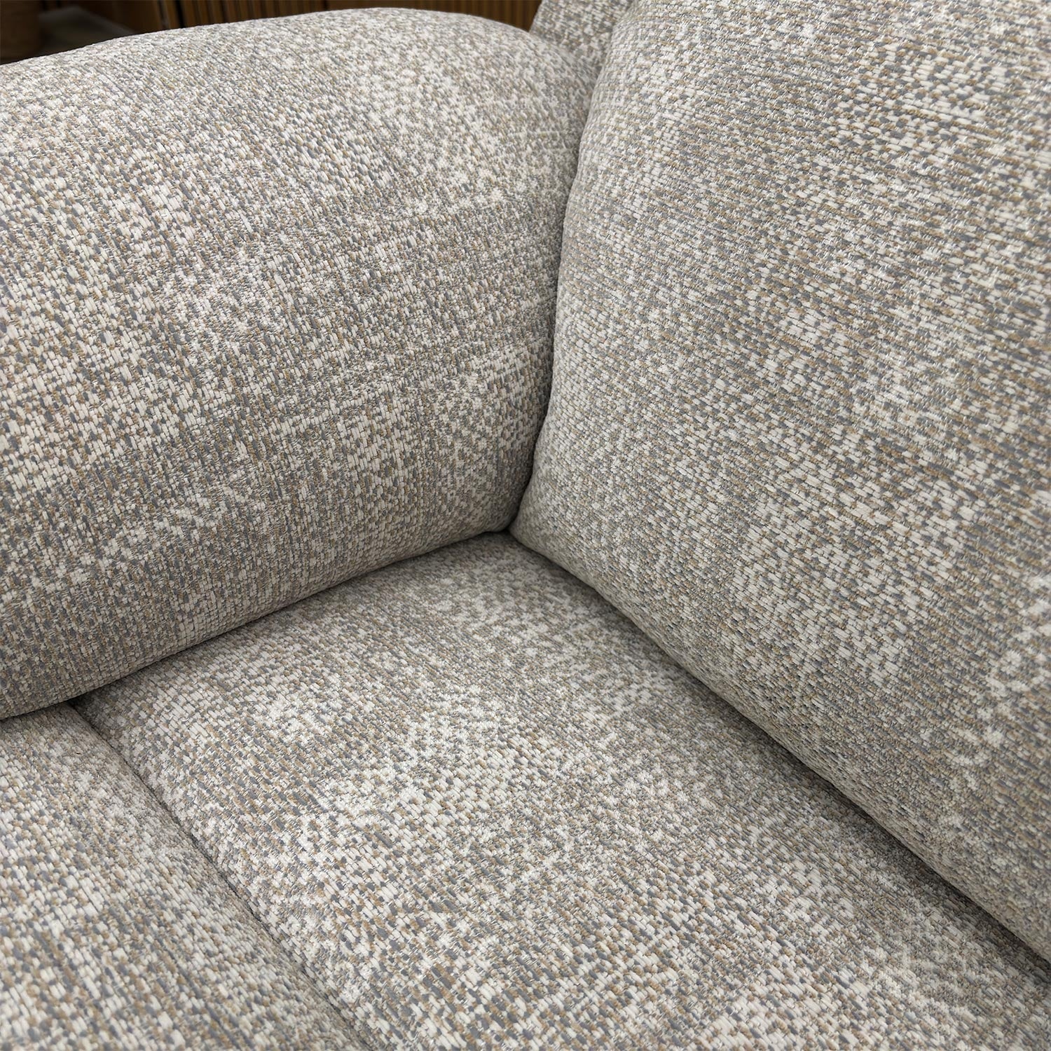 Close-up of the Aerial Horizon upholstery, emphasizing the durable woven texture and subtle grey tones.