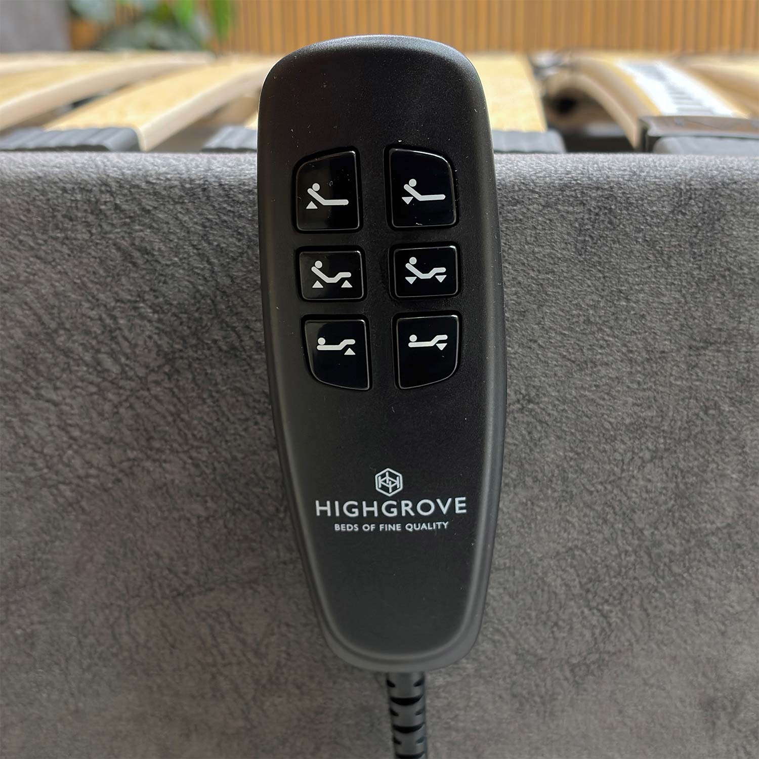 Remote control for the Warwick electric bed showing easy-to-use buttons for adjusting sleep positions.