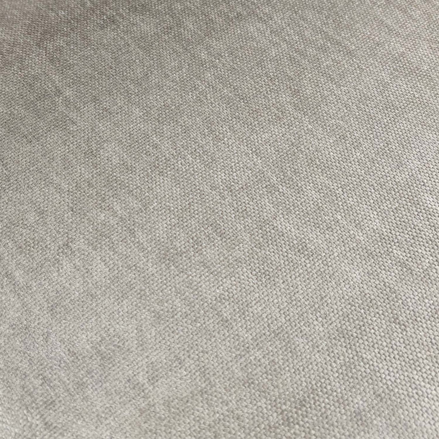 Close-up detail of the premium grey textured fabric upholstery and neat stitching on the seat.