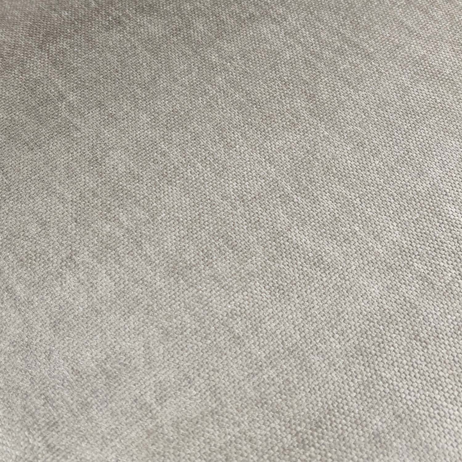 Close-up detail of the premium grey textured fabric upholstery and neat stitching on the seat.