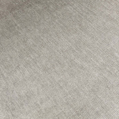 Close-up detail of the premium grey textured fabric upholstery and neat stitching on the seat.