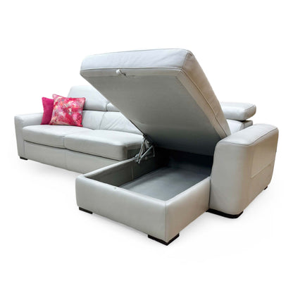 Side View of the ‘Infinity’ chaise section lifted open to reveal the spacious integrated storage compartment.