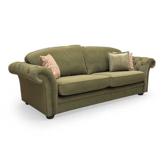 Full view of the Thornbrook ‘Vincent’ 4-seater sofa in luxurious olive green plush velvet.