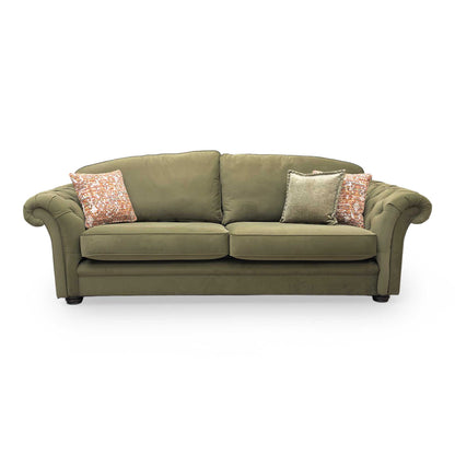 Front view of the Thornbrook ‘Vincent’ 4-seater sofa in luxurious olive green plush velvet.
