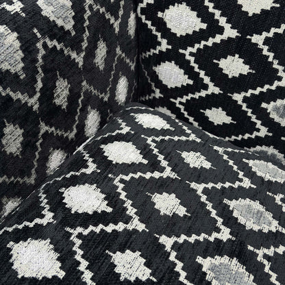 Close-up of the striking geometric diamond pattern fabric and high-quality upholstery work.