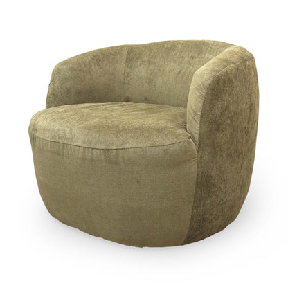 Side perspective of the ‘Terry’ accent chair, highlighting its streamlined silhouette and swivel base.