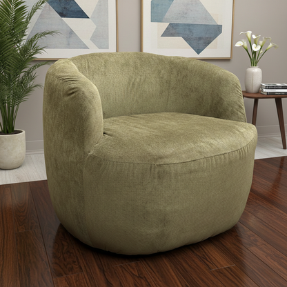 Living Room image of the ‘Terry’ sage green swivel chair in a modern, neutral-toned room.