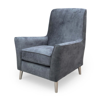 Rear view of the ‘Collins’ accent chair, illustrating its clean lines and high-quality upholstery finish.