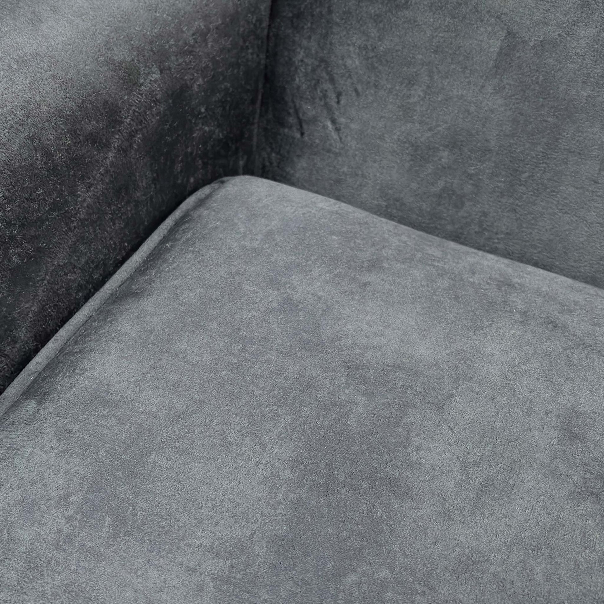 Detailed close-up of the granite grey infinity velvet fabric, showing the premium shimmering finish and soft touch.
