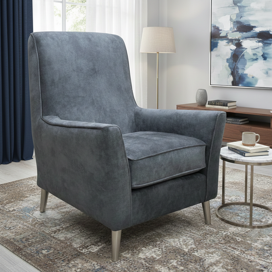 Living Room shot of the ‘Collins’ granite grey accent chair, showcasing its luxurious velvet texture and modern silhouette.