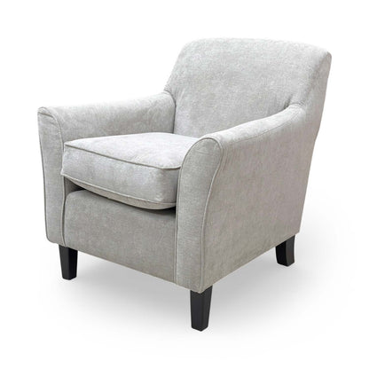 Side view of the Hammond Kiera accent chair showing the seamless grey fabric coverage and uniform finish.