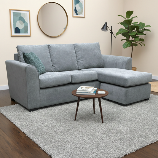 Living Room view of the ‘Ashley’ sofa, showing the reversible chaise and formal back cushions.