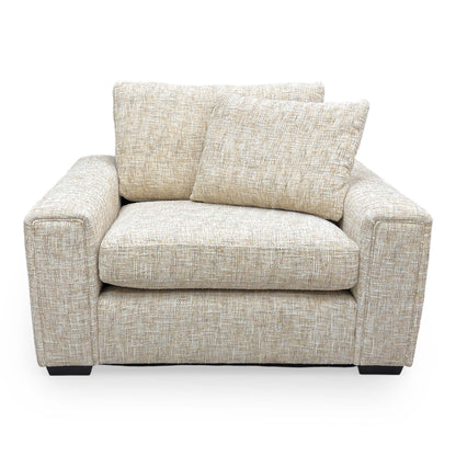 Front view of the Thornbrook ‘Burton’ Odyssey love chair in Marzipan Cream woven fabric.