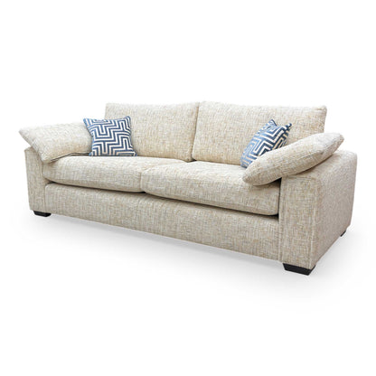 Side profile of the ‘Burton’ Odyssey sofa showing the armrest height and the depth of the formal back cushions.