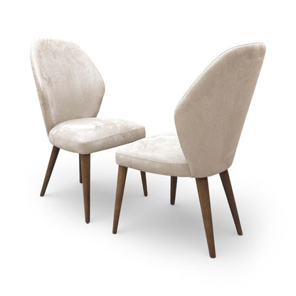 Full three-quarter view of a pair of Stone International ‘Emperor’ R066 dining chairs in satin taupe fabric.