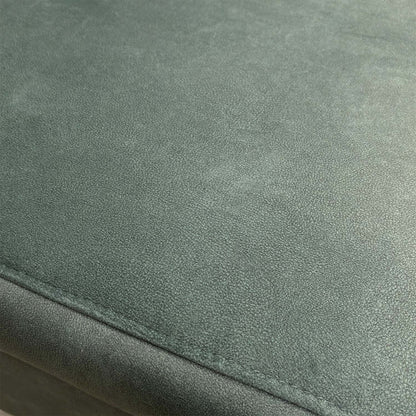 Detailed shot of the 43514 fern green velvet upholstery fabric and high-quality stitching.