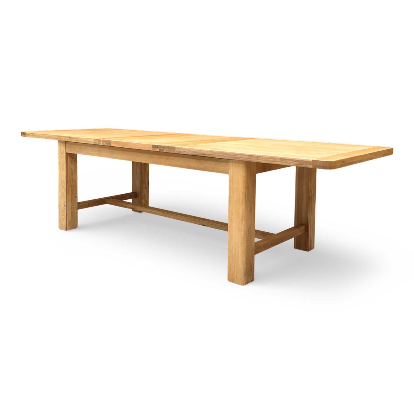Side profile of the Augusta dining table, illustrating its clean lines and timeless rustic aesthetic.