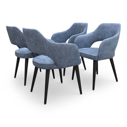 Rear view of the ‘Manu’ dining chair showcasing the uniform fabric coverage and clean, minimalist silhouette.