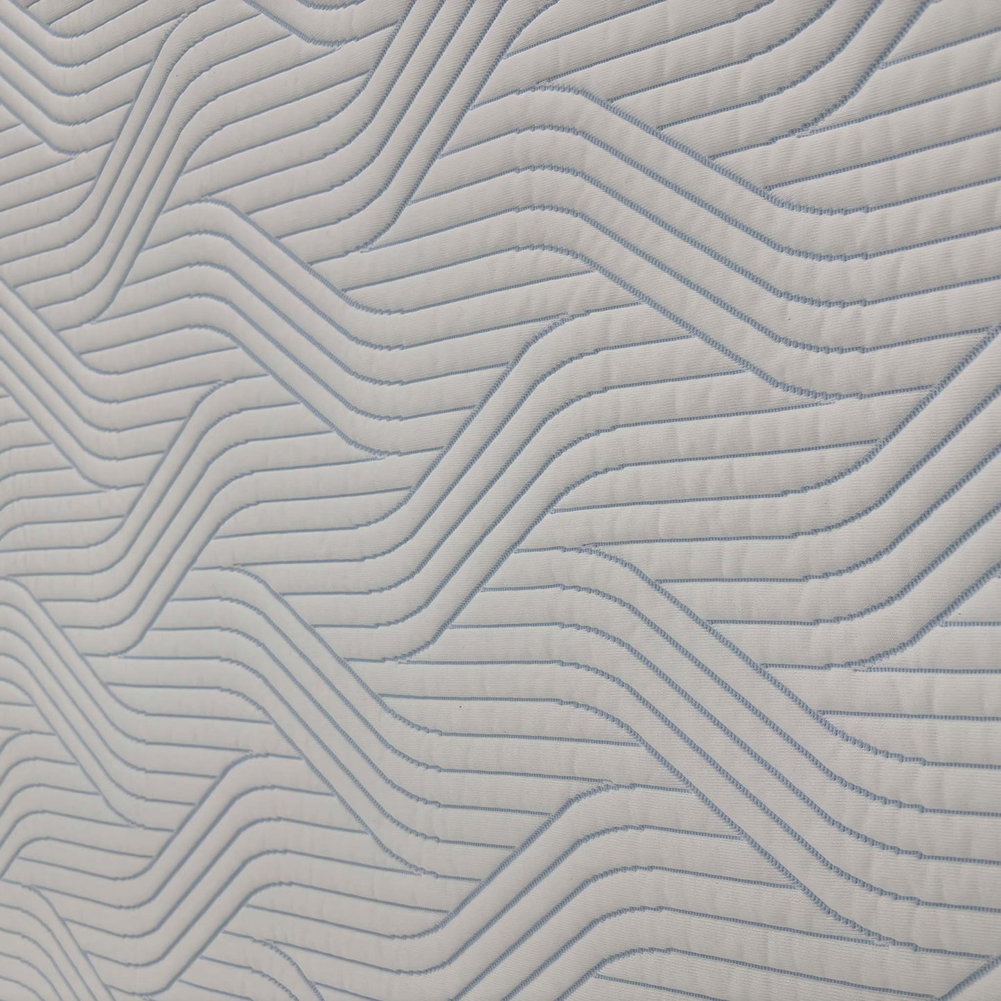 Close-up profile view of the TEMPUR mattress, illustrating the 25cm depth and the distinctive SmartCool fabric cover.