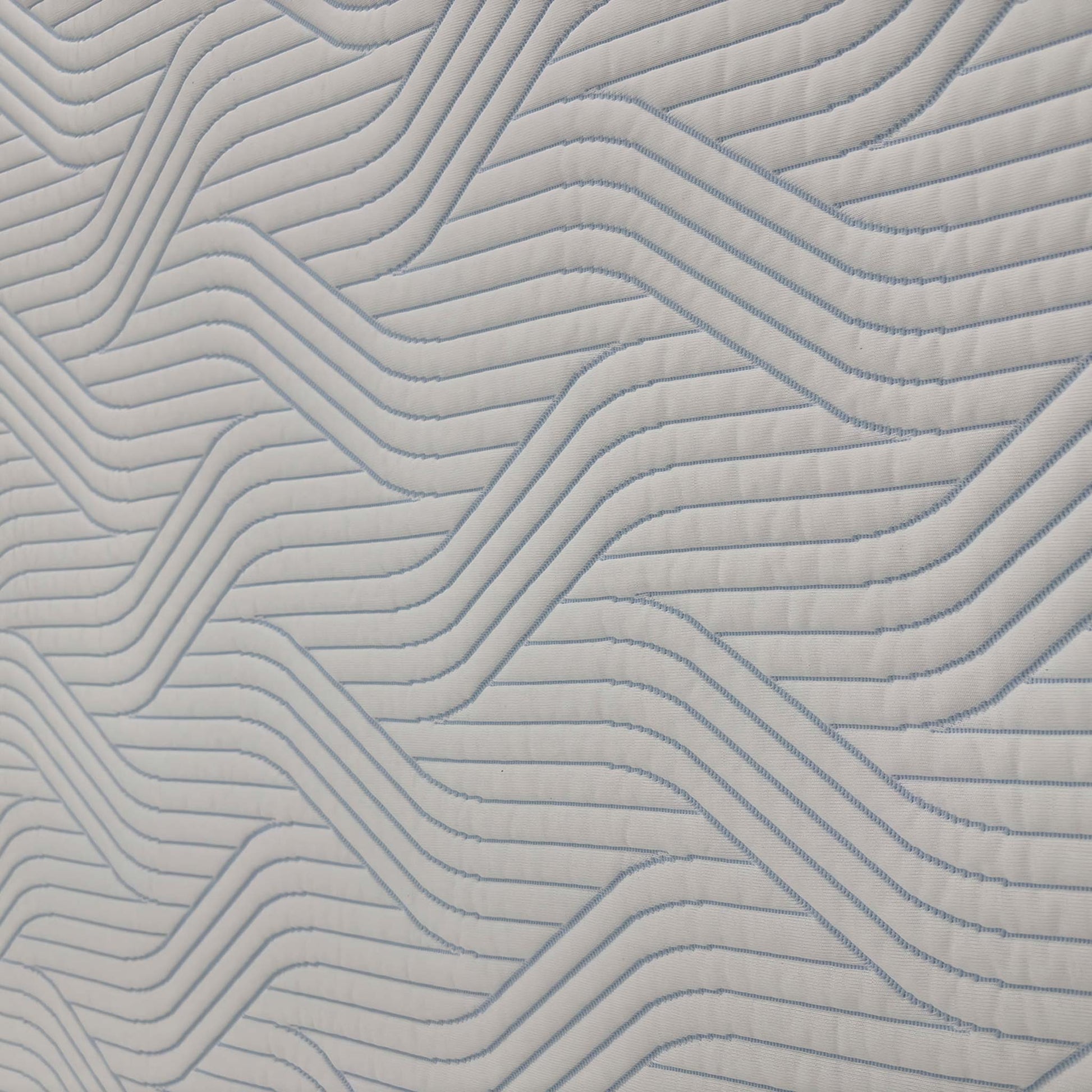 Close-up profile view of the TEMPUR mattress, illustrating the 25cm depth and the distinctive SmartCool fabric cover.