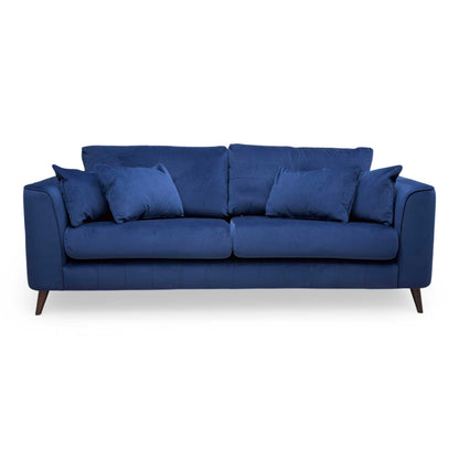 Full front view of the Sofology ‘Remy’ 4 Seater Sofa in vibrant Royal Blue Super Matt Velvet, featuring a sleek mid-century modern design.