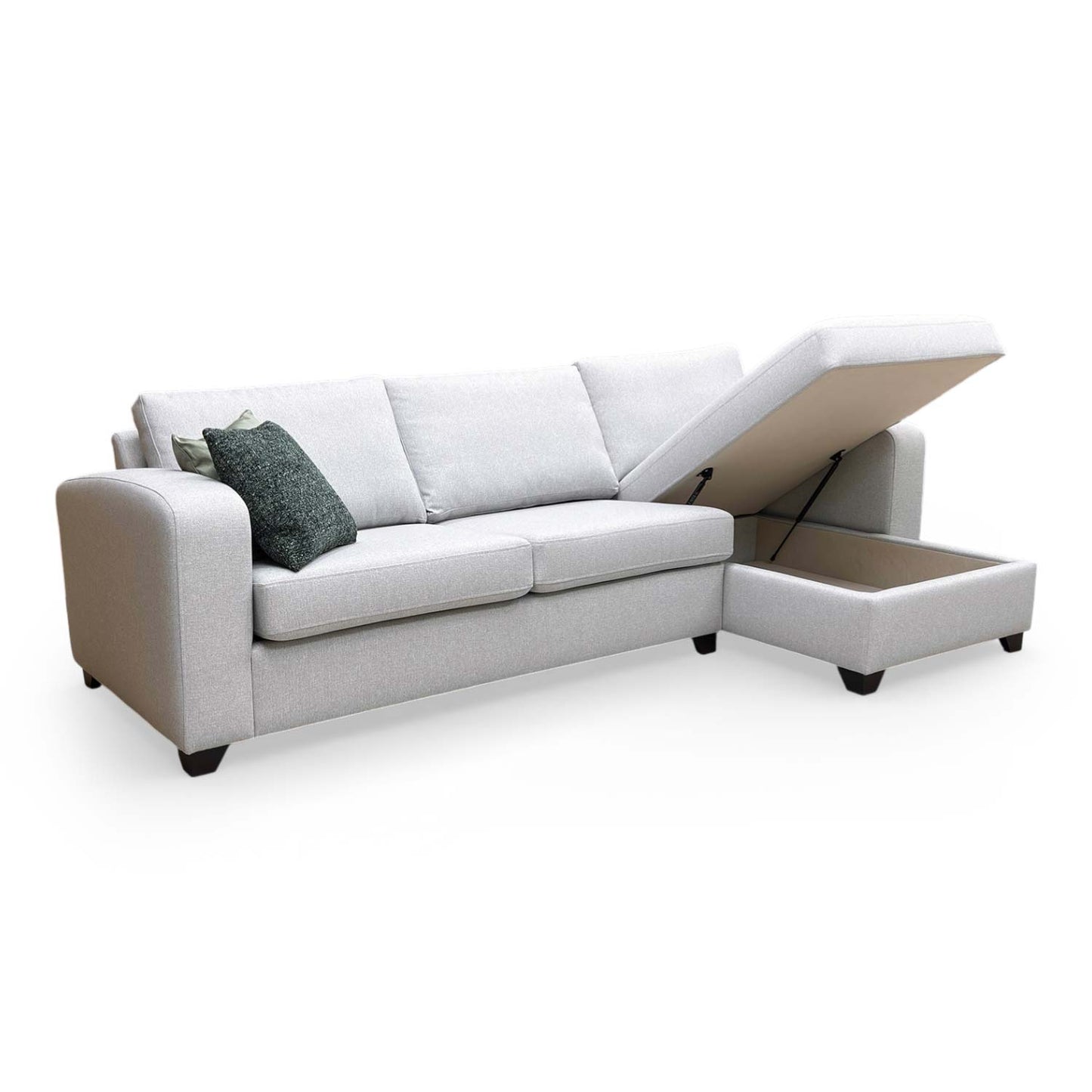 Top-down view of the integrated storage compartment inside the chaise end, perfect for storing bedding and pillows.