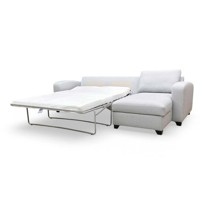 View of the sofa, demonstrating the finished upholstery on all sides for versatile room placement.