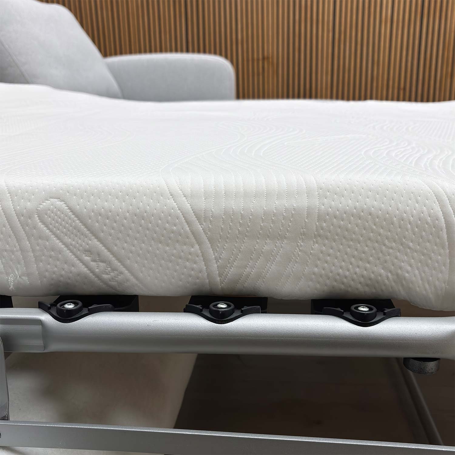 Side profile of the right-hand facing chaise, showing the depth of the seating area and modern silhouette.