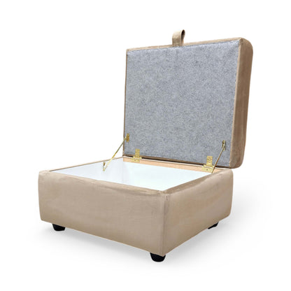 Top-down view of the Mink velvet ottoman, showcasing the uniform color and neatly finished upholstery seams.